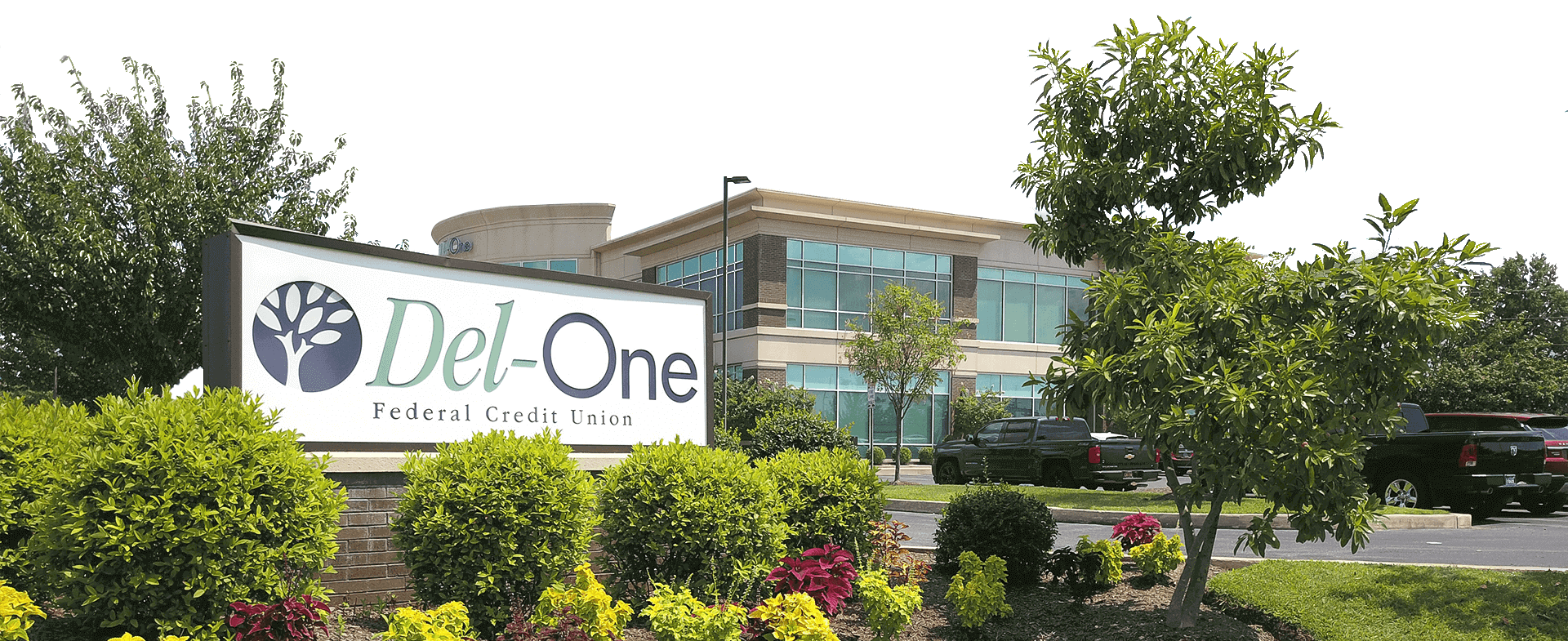 Image of an outdoor banner of Del-One FCU